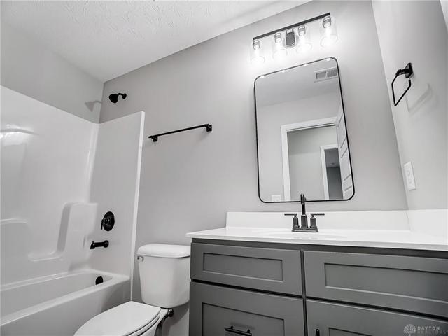 933030